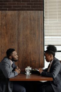 Two business associates meeting at a cafe.