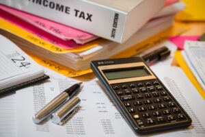 Tax books and a calculator.