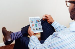 A business man working on a tablet.