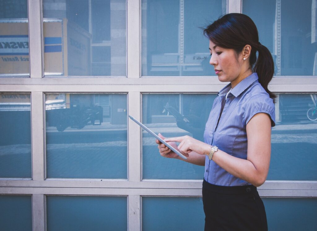 A businesswoman on her ipad.