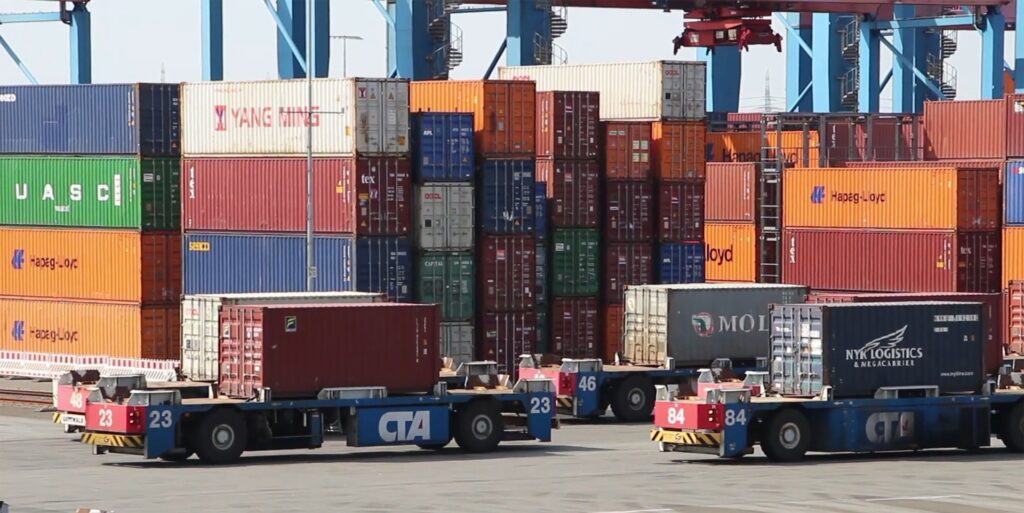 Shipping boxes at a harbor.