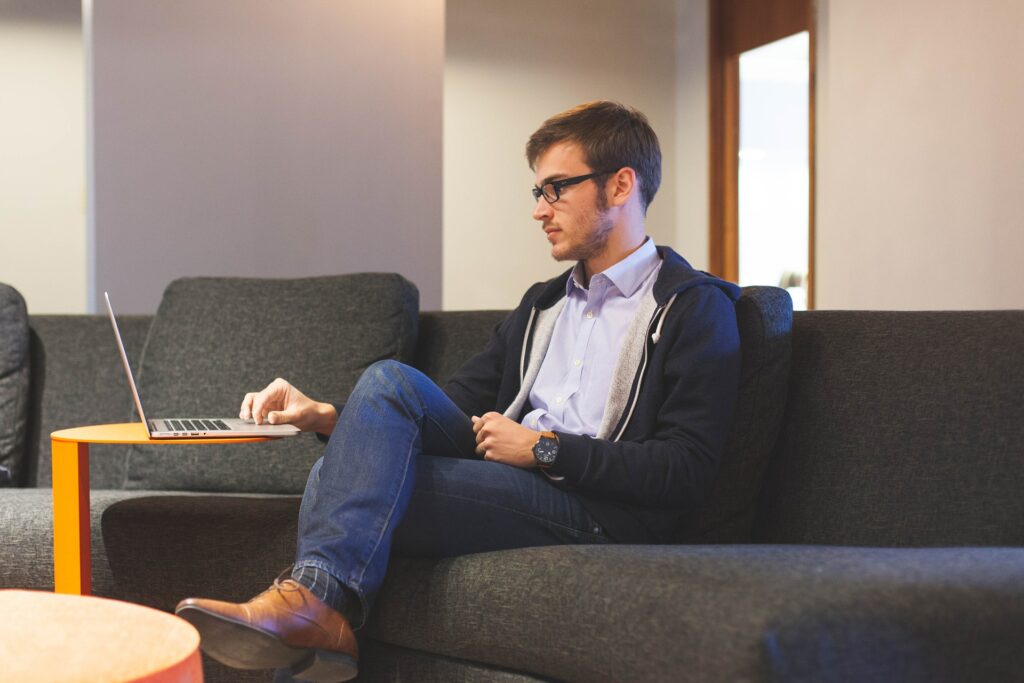 A man on a computer.